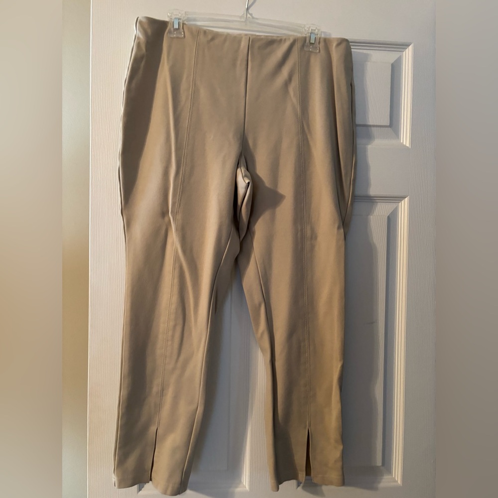 Like new Wonderly khaki pull on pants with split hem detail.  Size Large.